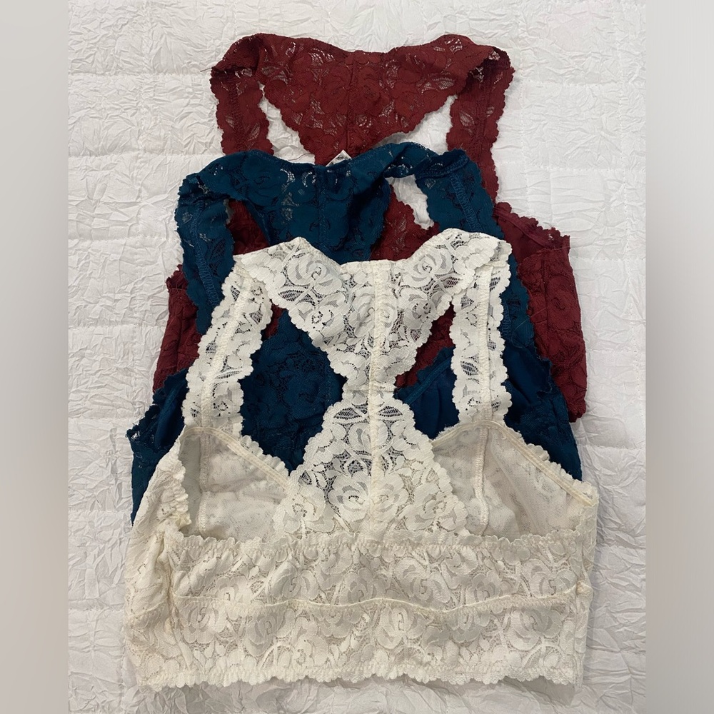 3 lace bras- White is a S and Burgundy/Navy are M. SEE PICS FOR CONDITION